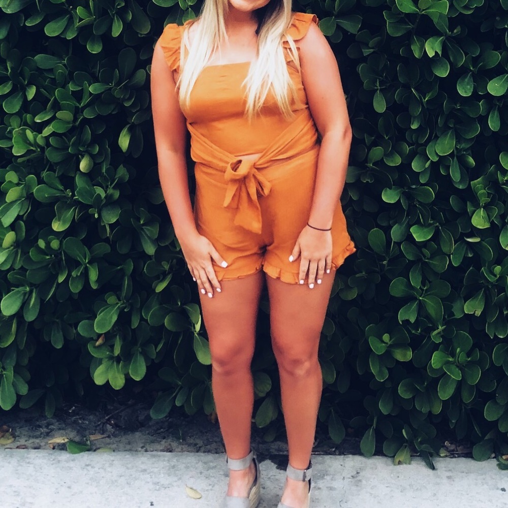 Orange two piece set, size L from these three boutique